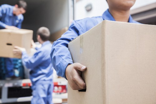 Staff member checking safety procedures inside a storage facility