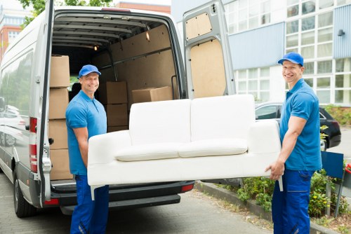 Office removals planning in Highbury with moving boxes and office furniture
