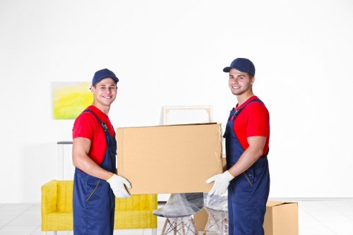 Professional movers handling a house removal in Highbury