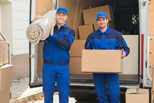 Person organizing belongings in a Highbury storage unit